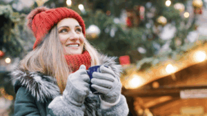 Women with hot chocolate gathered for the Christmas tree lighting.