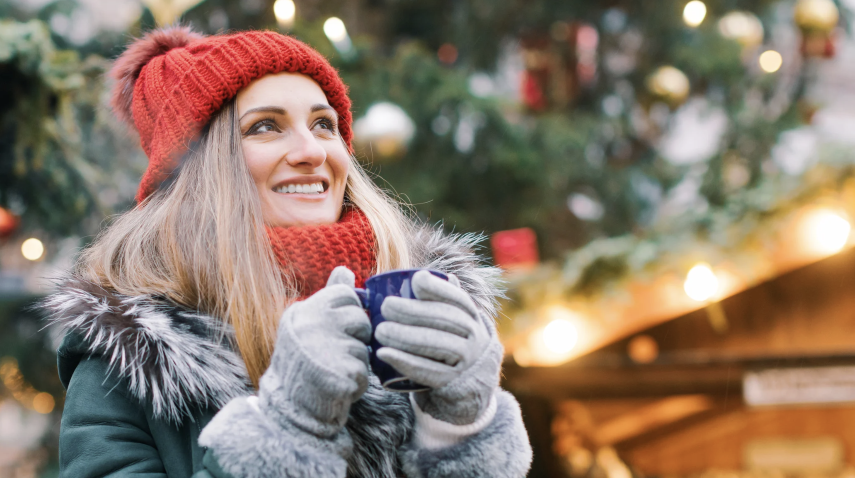 Women with hot chocolate gathered for the Christmas tree lighting.